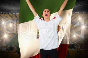 Football fan in white cheering holding mexico flag