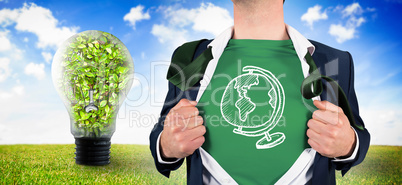 Composite image of businessman opening shirt in superhero style