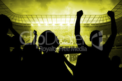 Silhouettes of football supporters