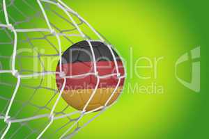 Football in germany colours at back of net