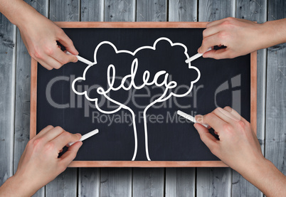 Composite image of multiple hands drawing idea tree with chalk