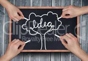 Composite image of multiple hands drawing idea tree with chalk