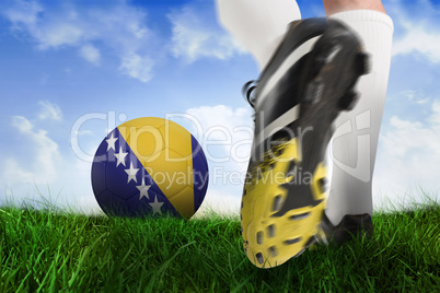 Football boot kicking bosnia ball