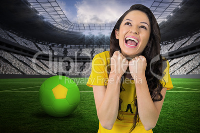 Excited football fan in brasil tshirt