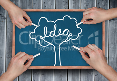 Composite image of multiple hands drawing idea tree with chalk