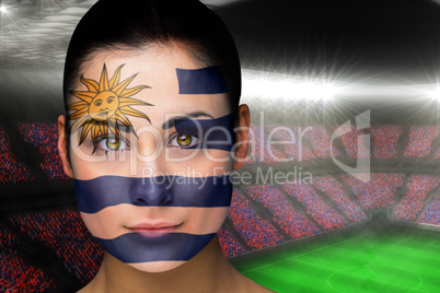 Beautiful uruguay fan in face paint