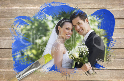 Composite image of newlyweds smiling at camera