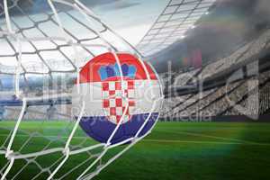 Football in croatia colours at back of net