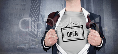 Composite image of businessman opening shirt in superhero style