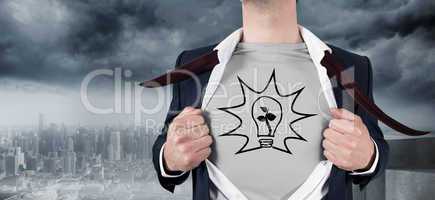 Composite image of businessman opening shirt in superhero style