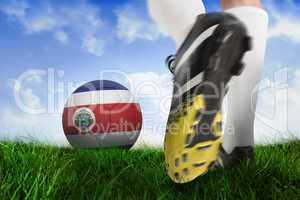 Football boot kicking costa rica ball