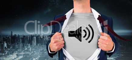 Composite image of businessman opening shirt in superhero style