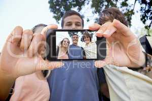 Composite image of hand holding smartphone showing