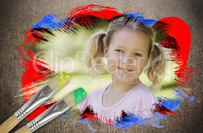 Composite image of little girl smiling in the park