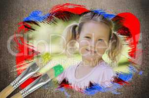 Composite image of little girl smiling in the park
