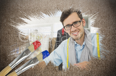 Composite image of fashion designer smiling at camera