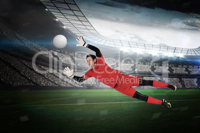 Fit goal keeper jumping up