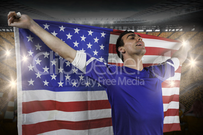 American soccer fan holding flag