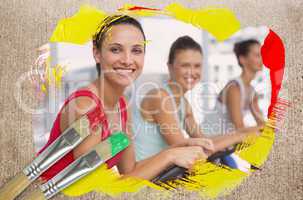 Composite image of spinning class in the gym