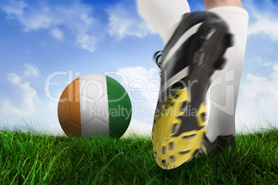Football boot kicking ivory coast ball