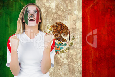 Excited mexico fan in face paint cheering