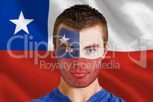 Serious young chile fan with facepaint