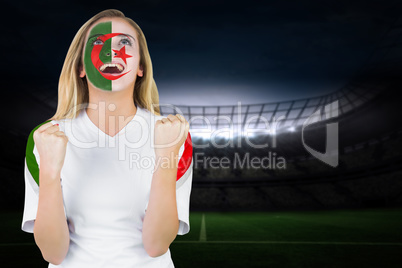 Excited iran fan in face paint cheering