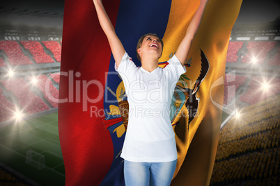 Pretty football fan in white cheering holding ecuador flag