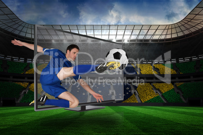 Football player kicking ball through tv