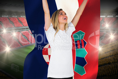 Pretty football fan in white cheering holding croatia flag