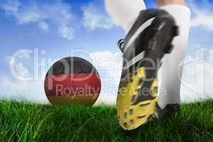 Football boot kicking belgium ball