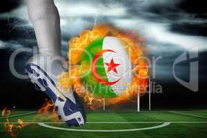 Football player kicking flaming algeria flag ball