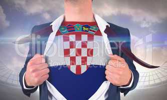 Businessman opening shirt to reveal croatia flag