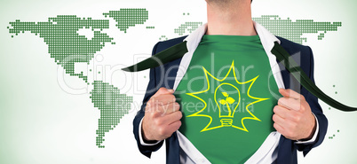 Composite image of businessman opening shirt in superhero style