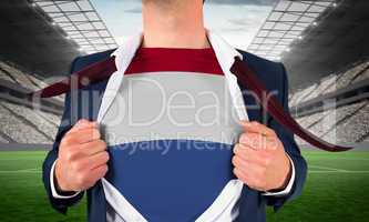 Businessman opening shirt to reveal netherlands flag