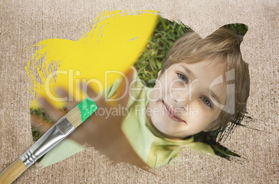 Composite image of little boy smiling at camera