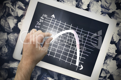 Composite image of hand touching tablet