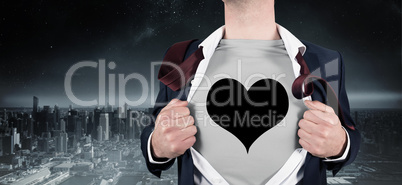 Composite image of businessman opening shirt in superhero style