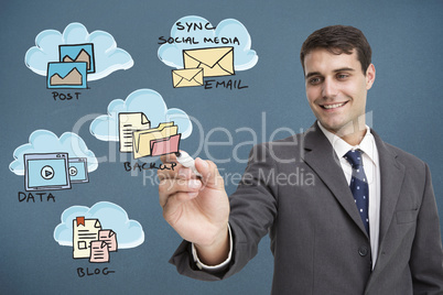 Composite image of businessman writing flowchart