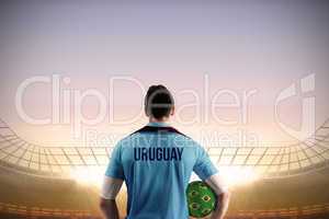 Uruguay football player holding ball
