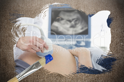 Composite image of pregnant woman getting an ultrasound