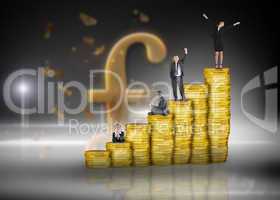 Composite image of business people on pile of coins