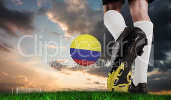 Composite image of football boot kicking colombia ball