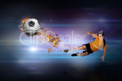 Composite image of football player in orange kicking