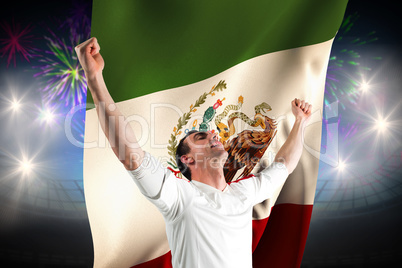 Composite image of excited football fan cheering