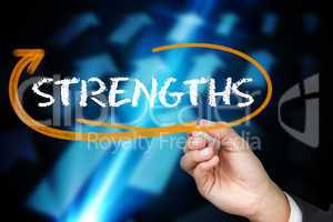 Businessman writing the word strengths