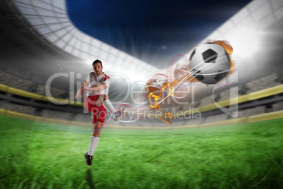 Composite image of football player in white kicking