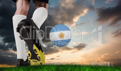 Composite image of football boot kicking argentina ball