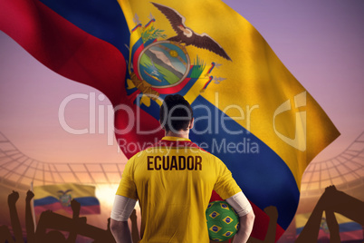 Composite image of ecuador football player holding ball