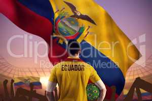 Composite image of ecuador football player holding ball